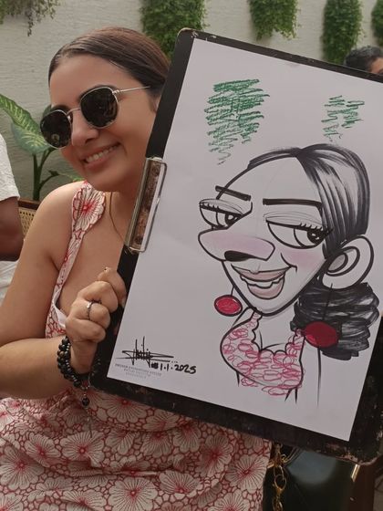 A stylish guest enjoying the New Year's brunch and her new caricature.