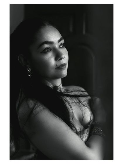 The same portrait in a different pose, capturing a look of contemplation. This black and white series is perfect for creating emotive, fine art wedding portraits.