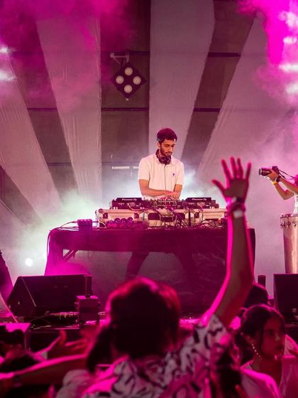 A closer look at the live performance setup, with me on the decks and the talented percussionists of Beat Gurus adding live rhythms.