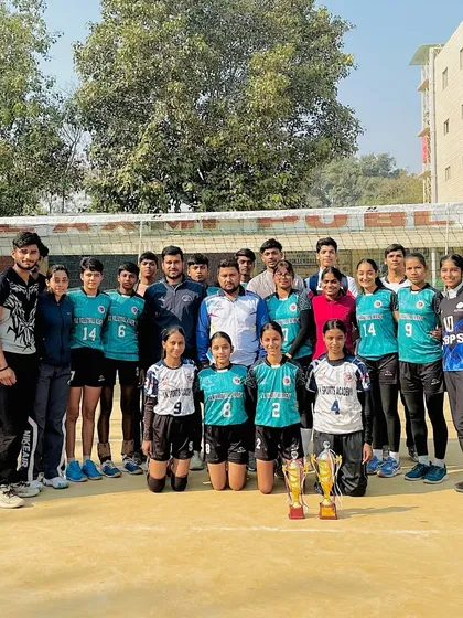 The whole family together. A large group photo of our boys and girls teams with their trophies, celebrating the success that comes from working together.
