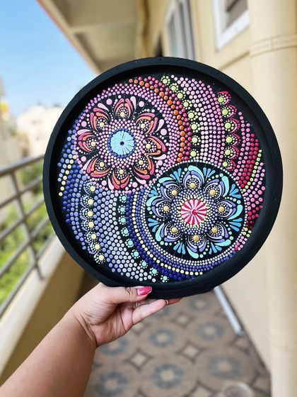 An absolutely stunning and unique yin-yang inspired dot mandala design created by a talented participant.