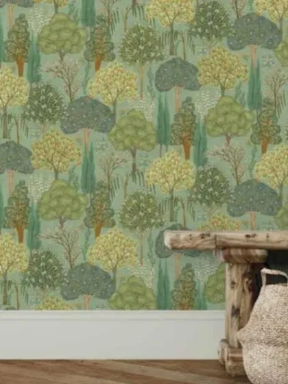 A beautiful forest mural wallpaper in a light green colorway. This whimsical design is perfect for creating a calming and imaginative space in a bedroom or reading nook.