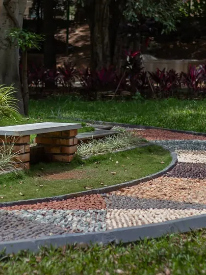 I specialize in creating unique, wellness-focused elements like this reflexology pathway. Designed with varied smooth stones, this path stimulates acupressure points on the feet, turning a simple walk in the garden into a therapeutic experience.