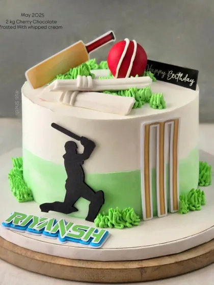 A classic cricket-themed cake for a fan's birthday. This 2kg Cherry Chocolate cake features a bat, ball, and wickets, all handcrafted.