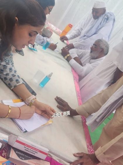 Our team distributing medicines as per the doctor's consultation at the camp. Providing access to both advice and resources is key to making a real impact.