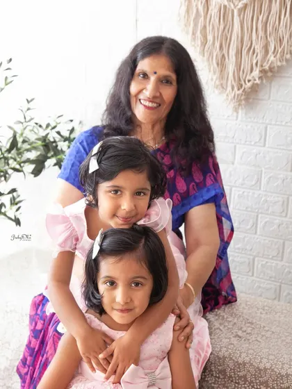 Grandmas are the coolest, and they give the best hugs. This portrait of a grandmother with her two granddaughters is just overflowing with love.
