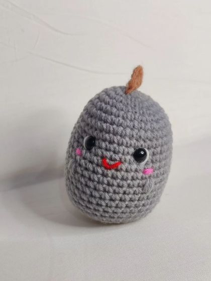 My tiny dino keychains are a handful of cuteness. They come in four different colors: blue, yellow, green, and grey.