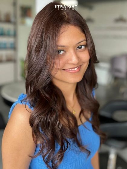 Another smiling shot of the client, glowing with confidence.