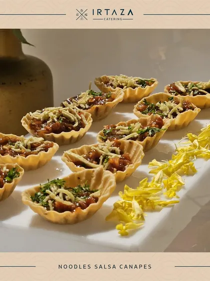 Noodles Salsa Canapes, an inventive fusion snack. Crispy canape shells are filled with a unique noodle and salsa mixture, offering a delightful crunch and a tangy flavor.