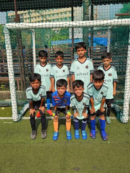 The U9 team posing before their MFA YPL match, looking focused and ready to play.
