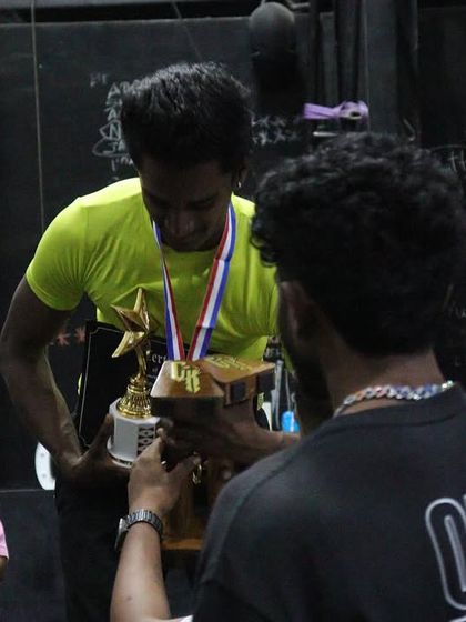 A winner is crowned at THE OG BAR WARS #1. The pride and accomplishment on their face says it all.