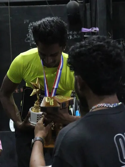 A winner is crowned at THE OG BAR WARS #1. The pride and accomplishment on their face says it all.