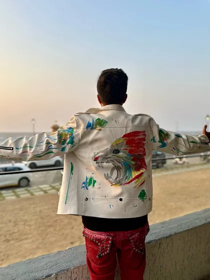 This custom-painted jacket with an eagle on the back was perfect for the carnival's energetic vibe. It's all about making a statement.