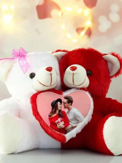 A cuddly Valentine's special: this couple teddy bear holds a heart-shaped frame that can be customized with your favorite photo.
