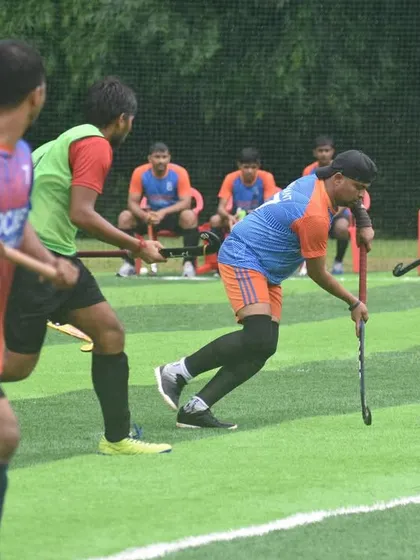 A player maneuvers the ball during a competitive practice match. Our sessions for juniors and adults are focused on developing tactical gameplay and teamwork.