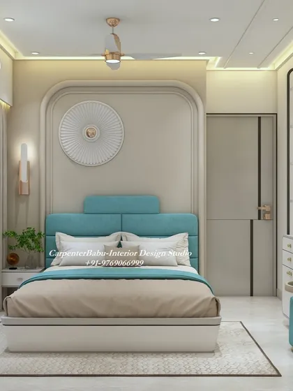 A bright and cheerful bedroom with a turquoise headboard and a modern circular wall art piece. The design is fresh, youthful, and full of positive energy.