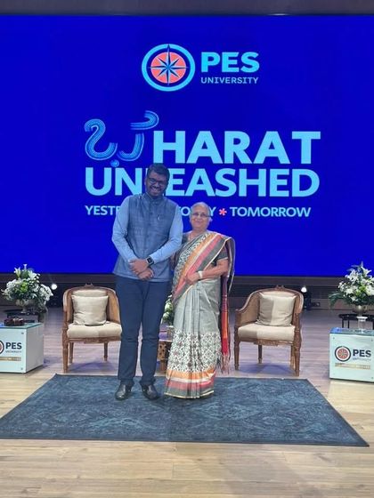 On stage with Smt. Sudha Murthy at "Bharat Unleashed". The event celebrated 50 years of PES University and looked ahead to the future of India.