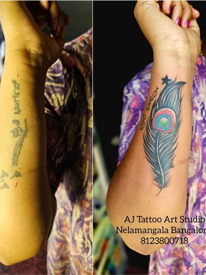 A faded design and lettering on the forearm are completely gone, replaced by this colorful and detailed peacock feather.