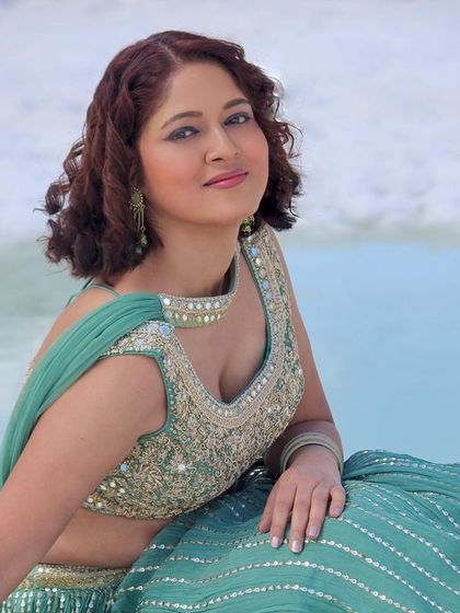 A serene and happy moment captured during the snowy photoshoot.