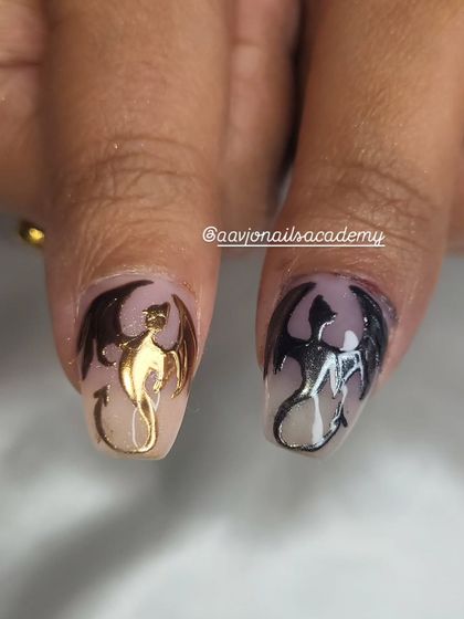 A detail shot of the two dragons, Tairn and Andarna. I used both gold and silver chrome to capture their distinct appearances from the book.