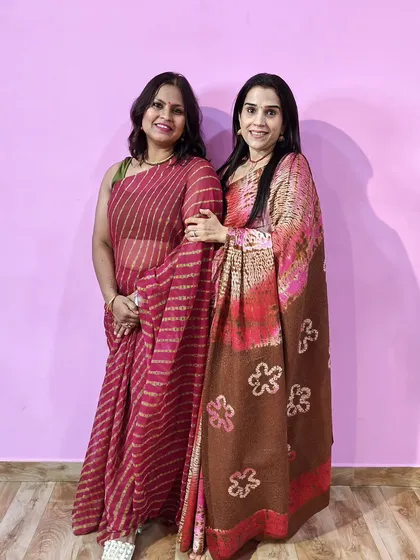 A picture with a dear friend during our Diwali celebration. The pink wall makes for a lovely photo background.