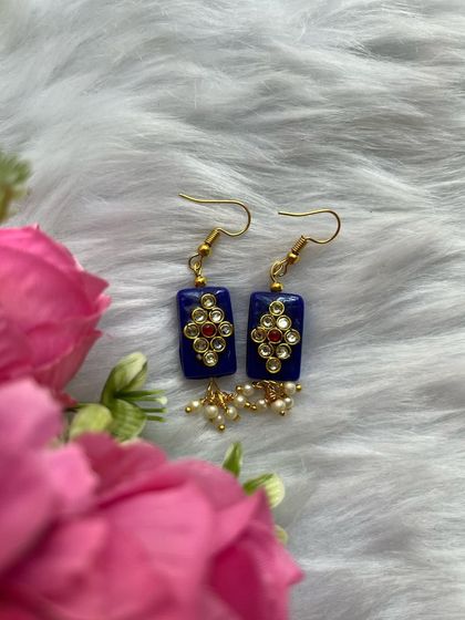 A collection of my simple, budget-friendly daily wear earrings in various blue and gold designs, perfect for college or office wear.