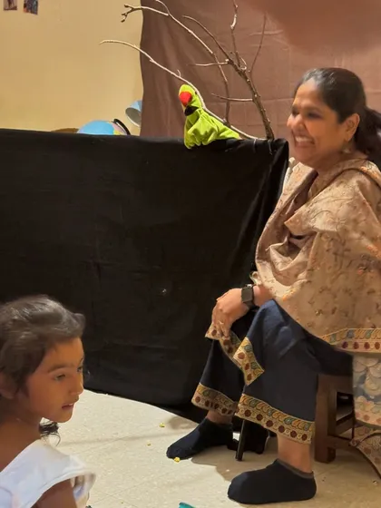 The joy of performing for children is unmatched. Here I am at a birthday party, sharing stories with a little friend and a puppet. These musical sessions for kids are always filled with laughter, interaction, and happy surprises.