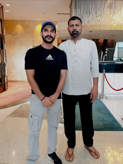 A moment with former Indian cricketer Praveen Kumar. My background as a national player helps me connect with athletes and understand their physical and mental challenges.