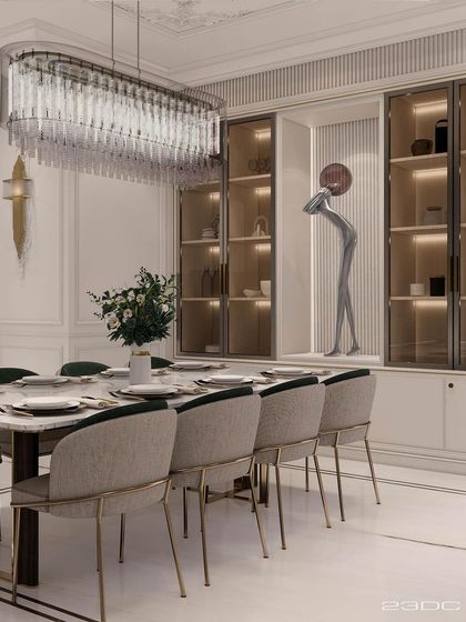 The dining area in this neo-classical project features elegant chairs with brass details and a stunning crystal chandelier. A built-in display cabinet with integrated lighting showcases curated art objects, adding a personal touch to the refined space.