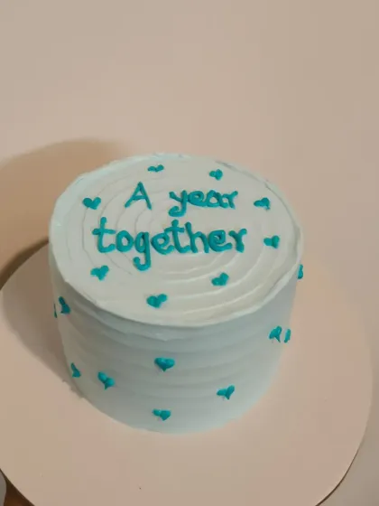 A cute and minimalist anniversary cake celebrating "A year together." This is a great example of my Pinterest-style bento cakes.