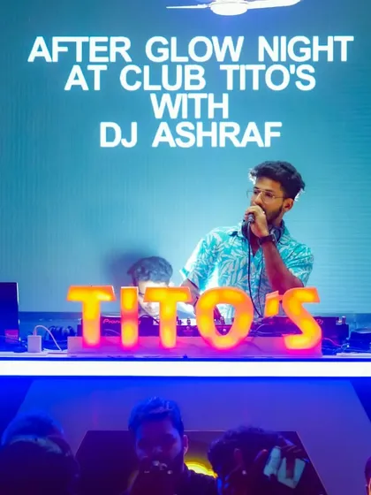 Headlining the "After Glow Night" at Club Tito's. The custom visuals on the LED screen and the iconic venue branding are all part of the premium clubbing experience I provide.