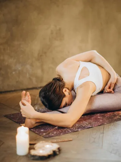 The Seated Forward Bend, or Paschimottanasana, is a calming pose that can help lower blood pressure and relieve stress, both of which are beneficial for heart health.