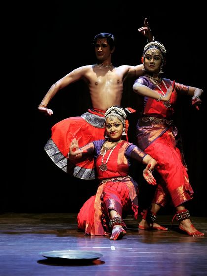 A group pose from my work "Abhinaya Vibhava", featuring the signature Kuchipudi brass plate. This highlights how we incorporate traditional elements into our ensemble performances.