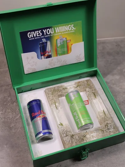 The complete PR kit for Red Bull's Green Edition launch, featuring the custom floral resin frame I designed.