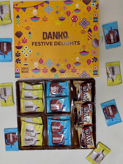 This Diwali, give the gift of happiness with Danko's Festive Delights. This box contains 23 pieces of assorted chocolates and brownies, perfect for sharing with family and friends.