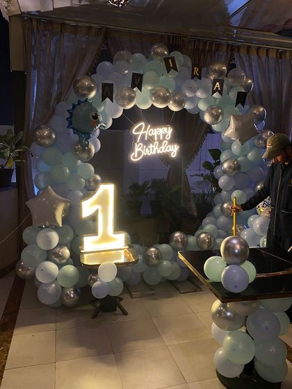 A behind-the-scenes look as we put the finishing touches on a first birthday decoration.