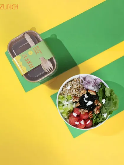 The Tropical Toss, ready to eat. This bowl combines the fresh crunch of spinach and cucumber with the satisfying texture of jowar grains and walnuts.