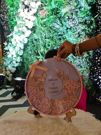 For their engagement, we created this interactive wish board. Guests wrote their blessings on little wooden hearts and dropped them into the frame. It’s a beautiful way to capture the love and support from family and friends on a special day.