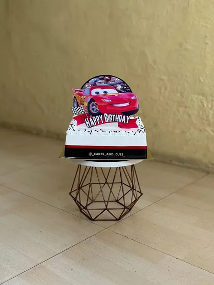 A single Cars-themed flat cake, perfect for a smaller celebration or as an add-on to a larger dessert table.