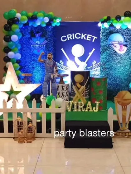 The cricket party setup from another angle, showing the dynamic lighting and the arrangement of props on the stage.