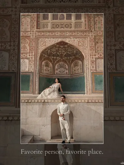 A majestic shot at Amer Fort in Jaipur, where the couple is framed by the intricate, historic architecture, showcasing the grandeur of a royal-themed pre-wedding shoot.