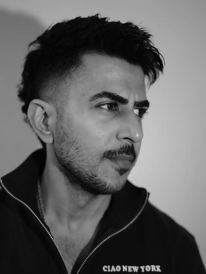 A three-quarter view of the modern mullet, showcasing its edgy and contemporary silhouette.