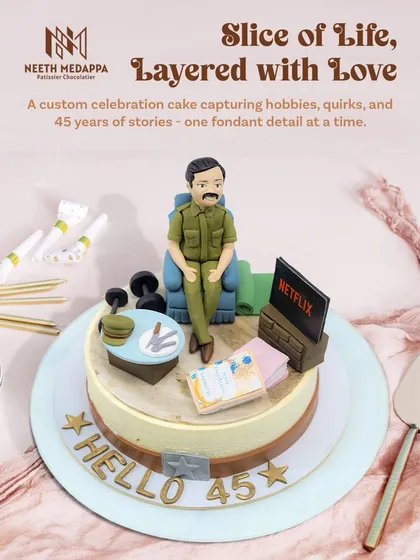 This is what I mean when I say I turn your story into a cake. Created for a 45th birthday, this design captures a slice of life, complete with a favorite armchair, Netflix on the TV, dumbbells for a workout hobby, and other personal details that tell a unique story.