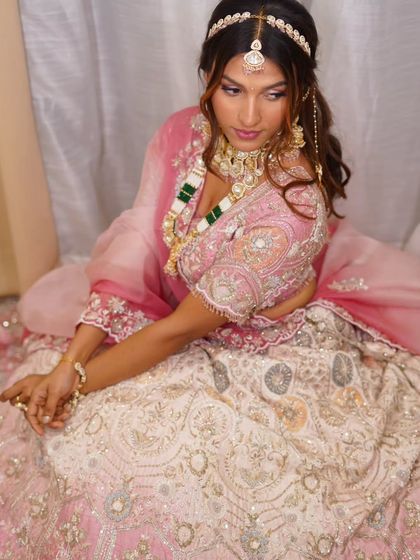 Lost in a dream. This pink and white ombre lehenga is perfect for the modern bride who loves a touch of romance. The entire look, including jewellery, is for rent.