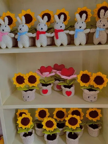 A mix of my popular decor items, including amigurumi bunnies, heart-shaped potted flowers, and sunflowers.