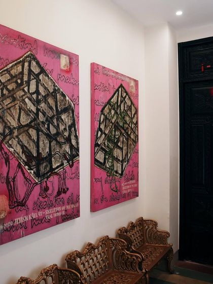 Art is integral to our identity. This piece by Jitish Kallat, "The Skeleton of My Ancestral Home," greets you at the entrance to i-Bar, where stories linger long after the paint dries.