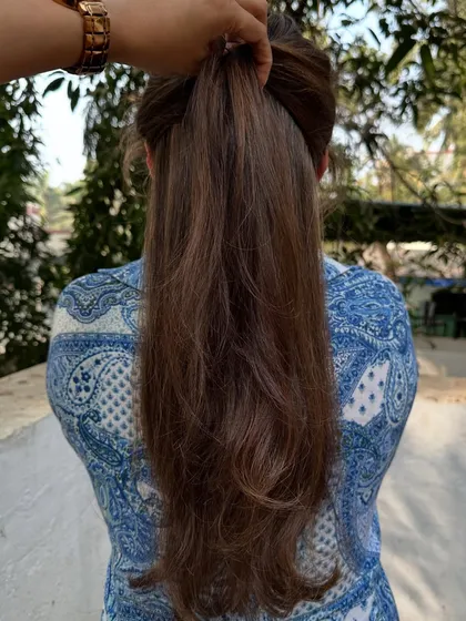 This 'Warm Caramel' look is a perfect example of a beautiful grey coverage transformation. I blended the greys seamlessly into a warm, multi-tonal brunette that looks completely natural.