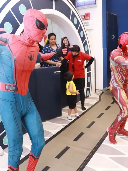 Spiderman and Iron Man make a grand entrance, ready to entertain the kids and make the party unforgettable.