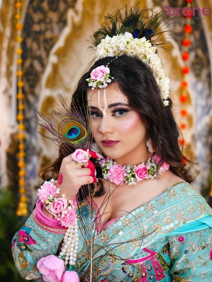 This shot highlights the complete look, including the floral hand jewelry and the perfectly coordinated makeup.