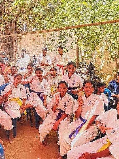 The crowd of students and family, enjoying the tournament day. It's a community event for everyone.